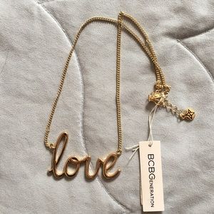BCBG LOVE gold love necklace